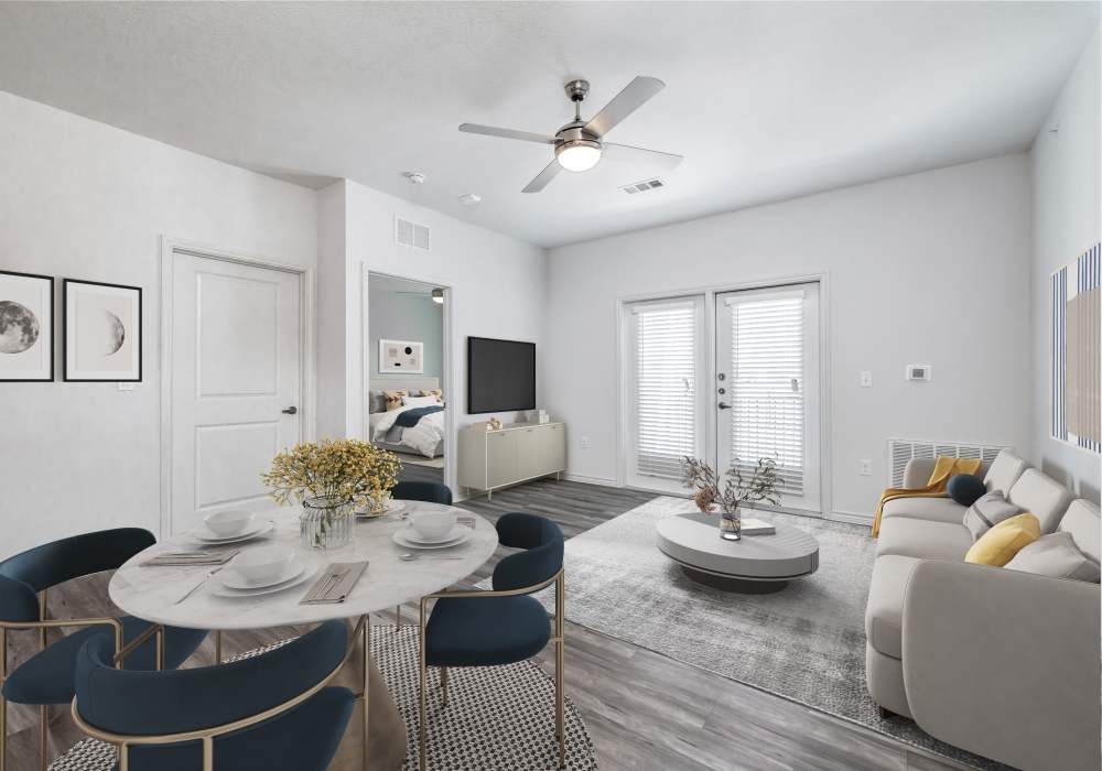 Modern living room with dining area at Oak Creek in New Braunfels, Texas