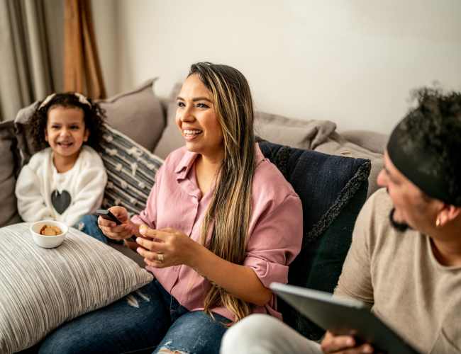 Happy resident family at Villas Del Lago in Los Angeles, California