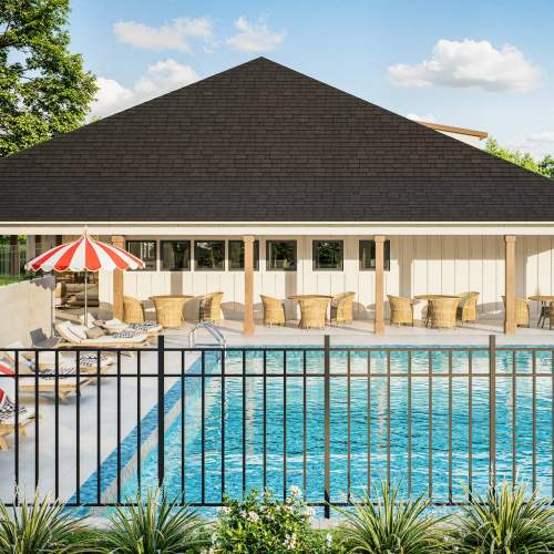 Resort-style pool area with lounge seating at Russ Town Crossing in Ruston, Louisiana