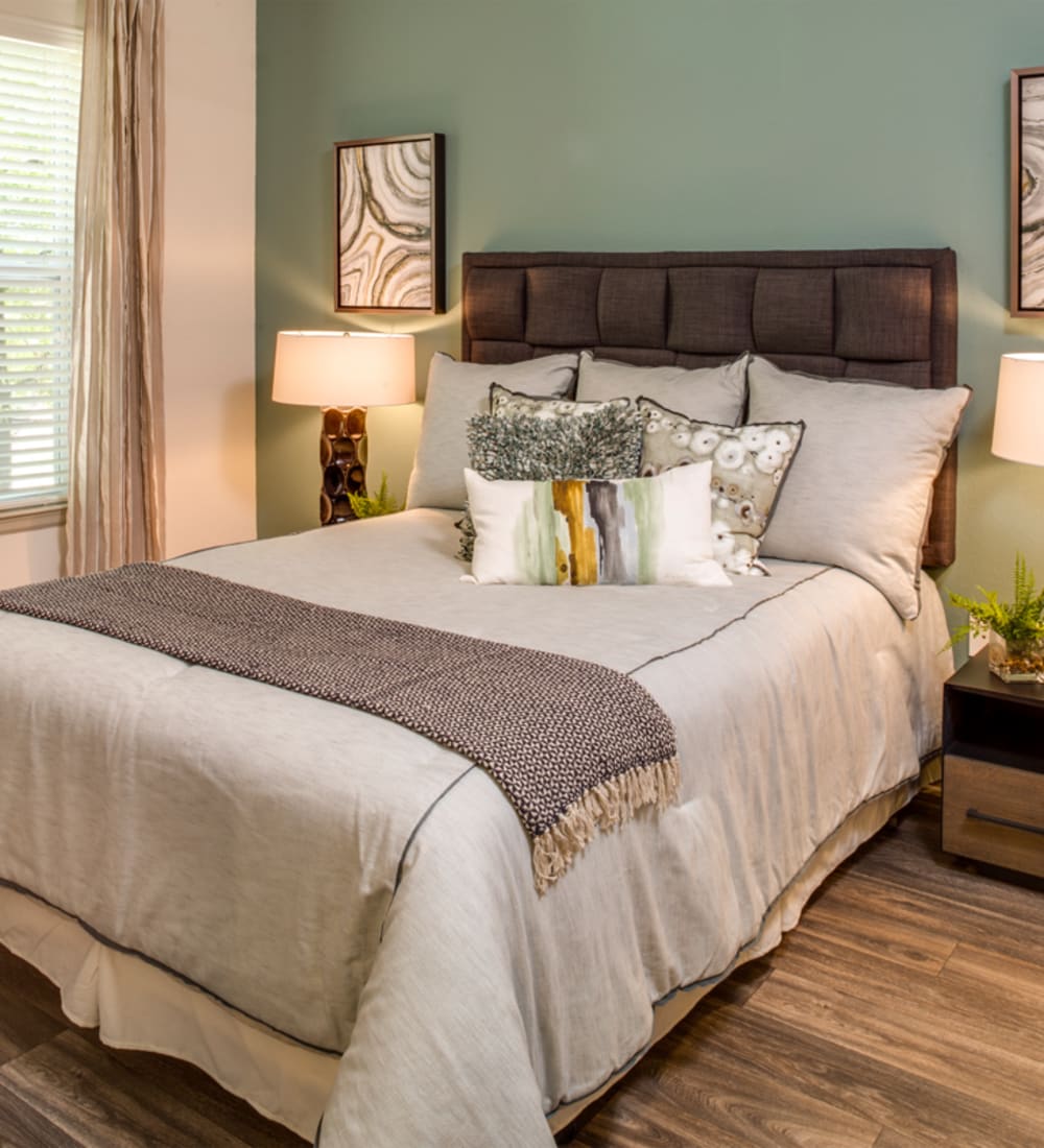 Model bedroom with wood flooring at 17 Barkley in Gaithersburg, Maryland