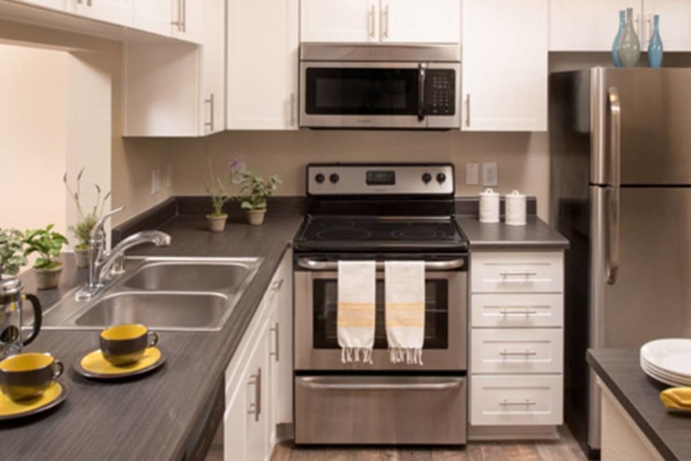 Beautiful, gourmet kitchen in a model home at Alize at Aliso Viejo Apartment Homes in Aliso Viejo, California