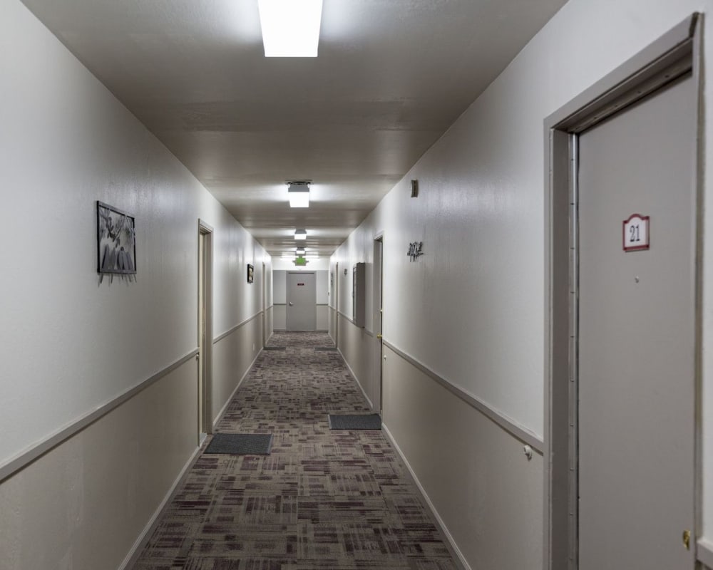 Apartment building hallway at Courtyard in Hayward, California