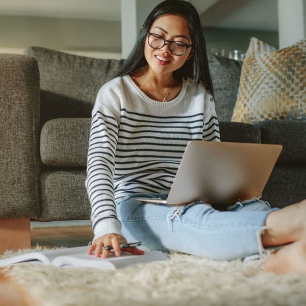 A resident studies in her apartment at Elevations One, Woodbridge, Virginia