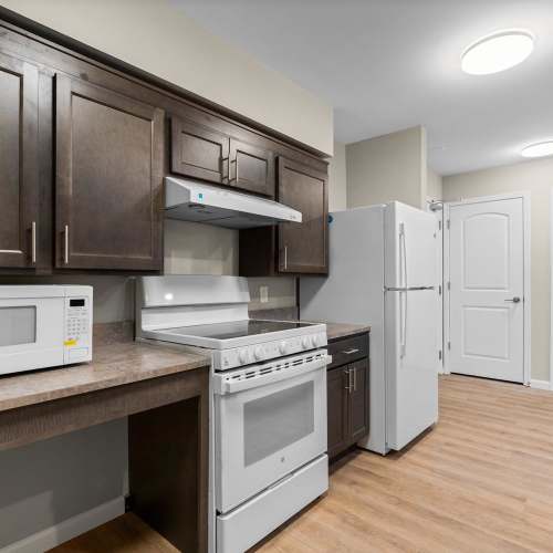 Kitchen with range Millersview Crossing in Millersville, Maryland