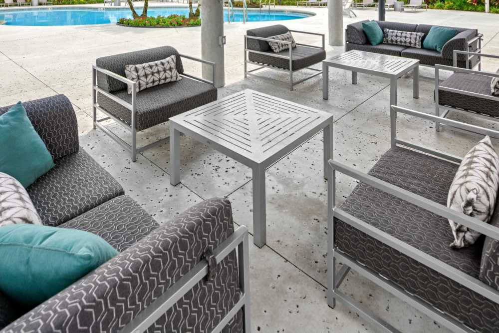 Outdoor covered patio seating at Pointe Parc at Avalon in Orlando, Florida