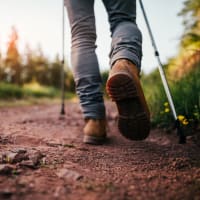 A resident hiking on a trail at Stonecreek Club in Germantown, Maryland