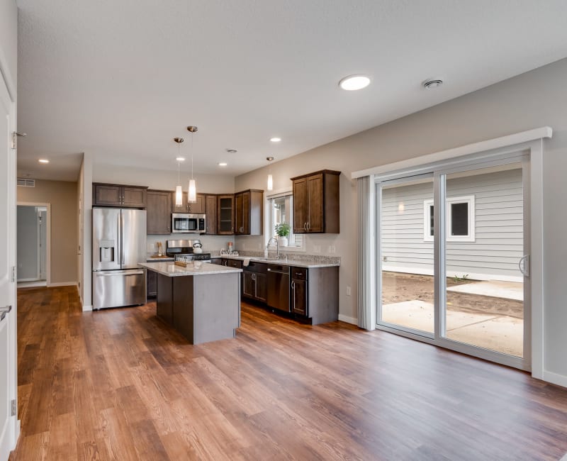 Kitchen with hardwood floors at The Fields at Arbor Glen in Lake Elmo, Minnesota