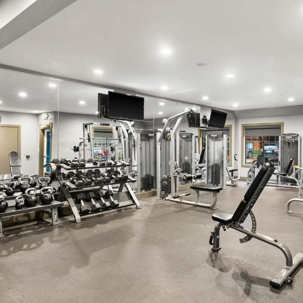 Well-equipped fitness center at Lodge at Madrona Ridge in Tacoma, Washington