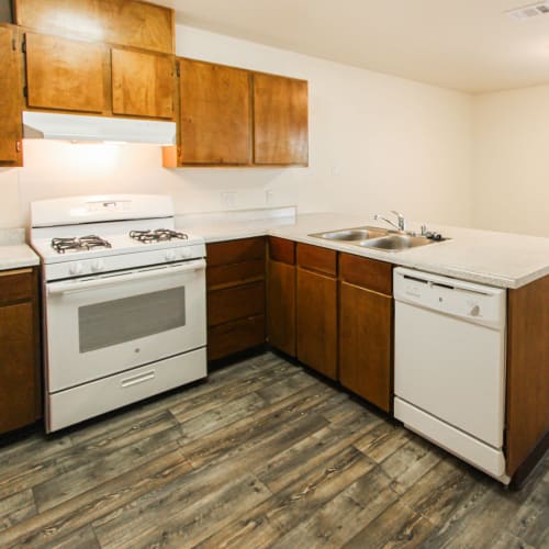 A kitchen in a home at Howard Gilmore Terrace in La Mesa, California