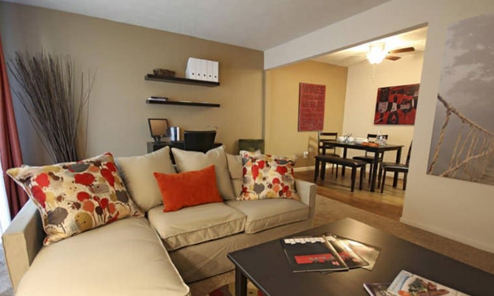 Well-decorated living room and dining area at Lakeside Landing Apartments in Lakeside Park, Kentucky