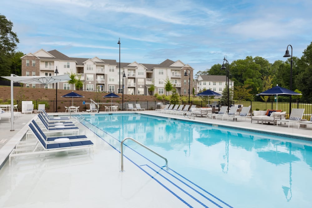 Swimming pool with lounge chairs at The Archer In Acworth in Acworth, Georgia