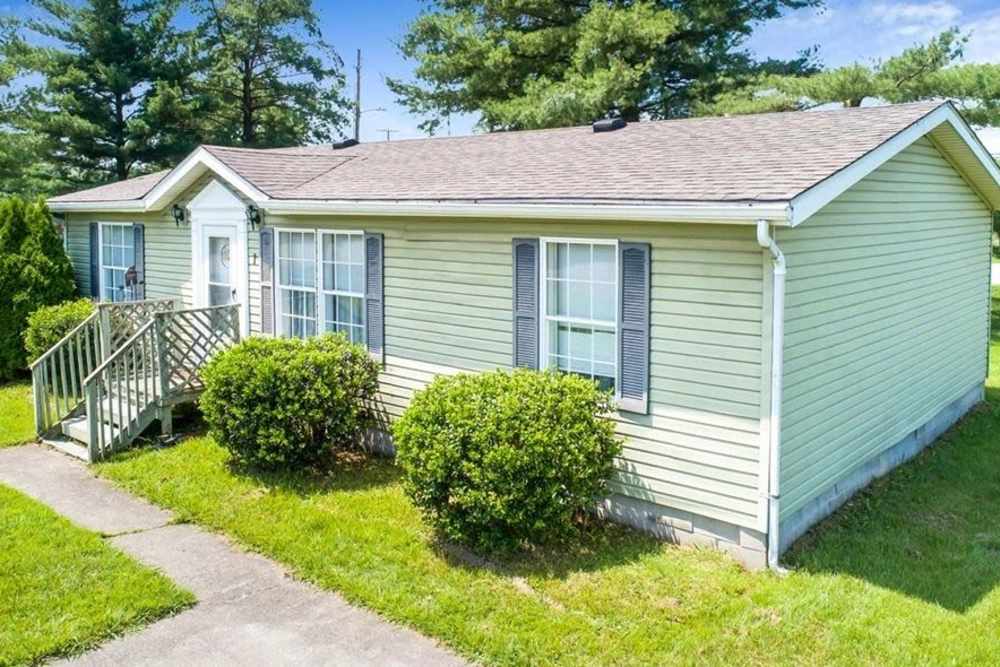Lush green house at Fairview Crossing in Scottsburg, Indiana