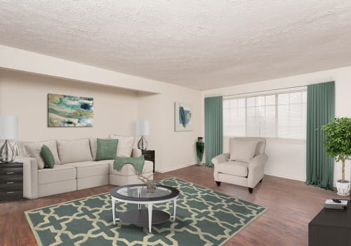 Well-lit Living room at Waverlywood Apartments & Townhomes in Webster, New York