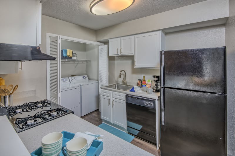 Modern kitchen with beautiful wood cabinets at The Madison in Charlotte, North Carolina