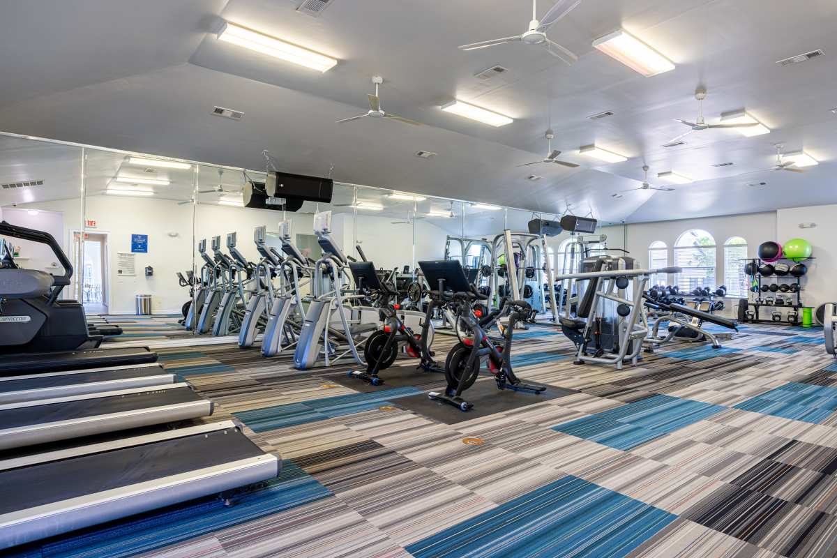 Fitness center with treadmills, cyclying and other equipments at Century Travesia in Austin, Texas