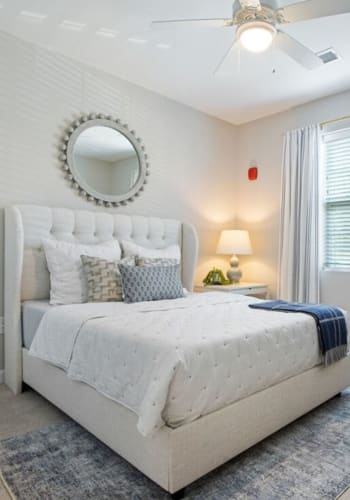 Model bedroom with wall-art at Loftin I in Belmont, North Carolina