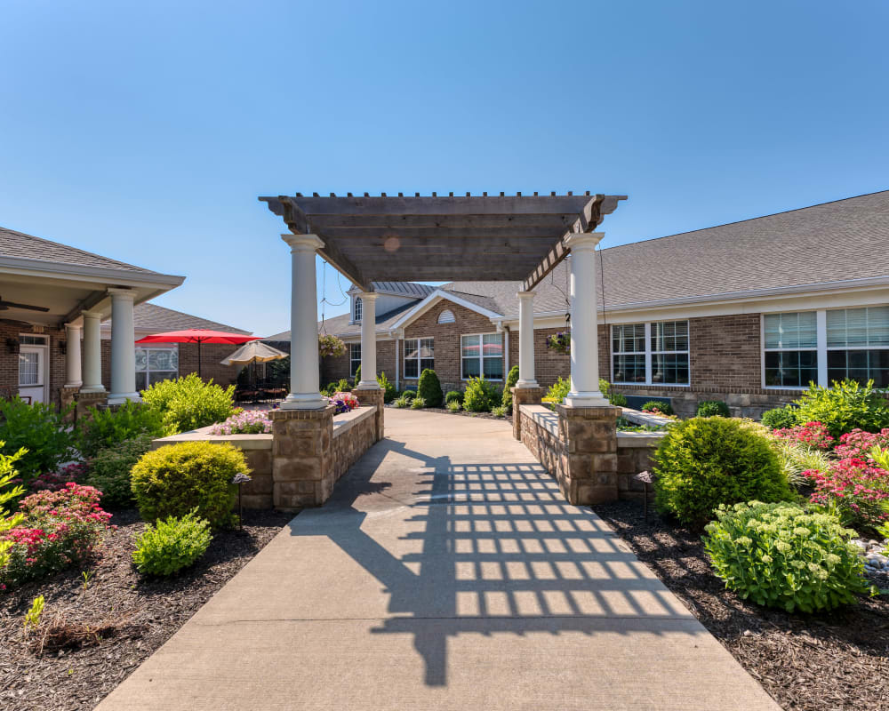 Paved walkway outside at Addington Place of Shoal Creek in Kansas City, Missouri