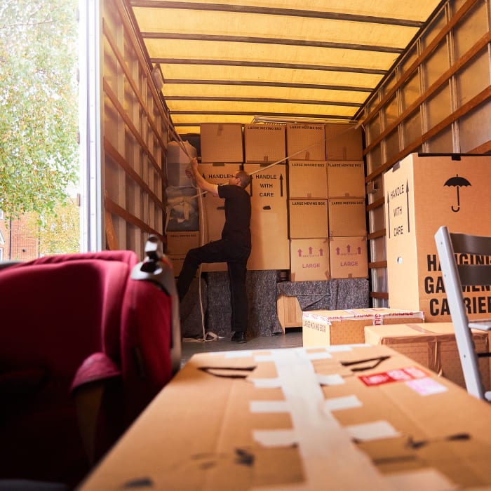 A customer organizing their moving van at Urban Self Storage.