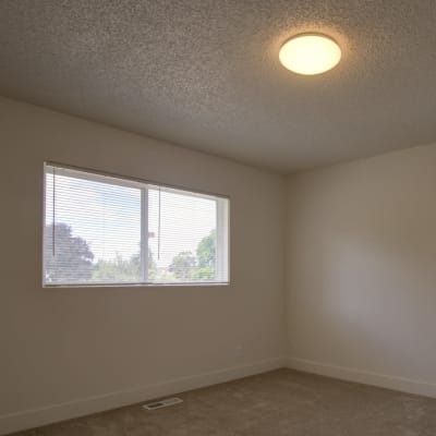 A well-lit bedroom at Clarkdale in Joint Base Lewis McChord, Washington