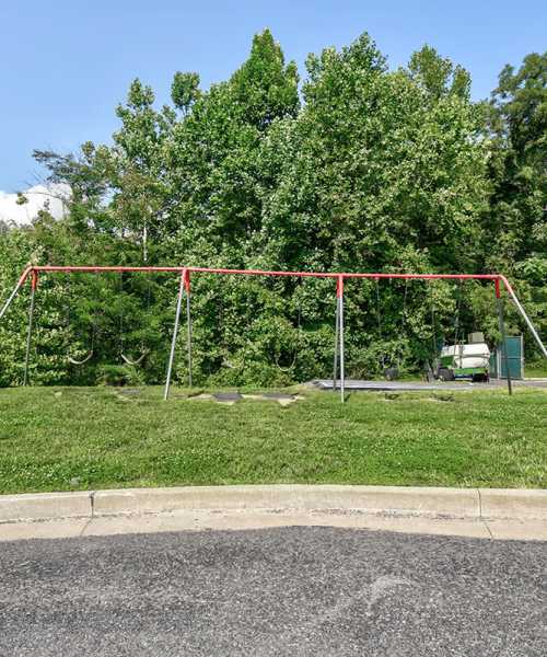 Playground swing set at Cedar Glen I in Morgantown, West Virginia