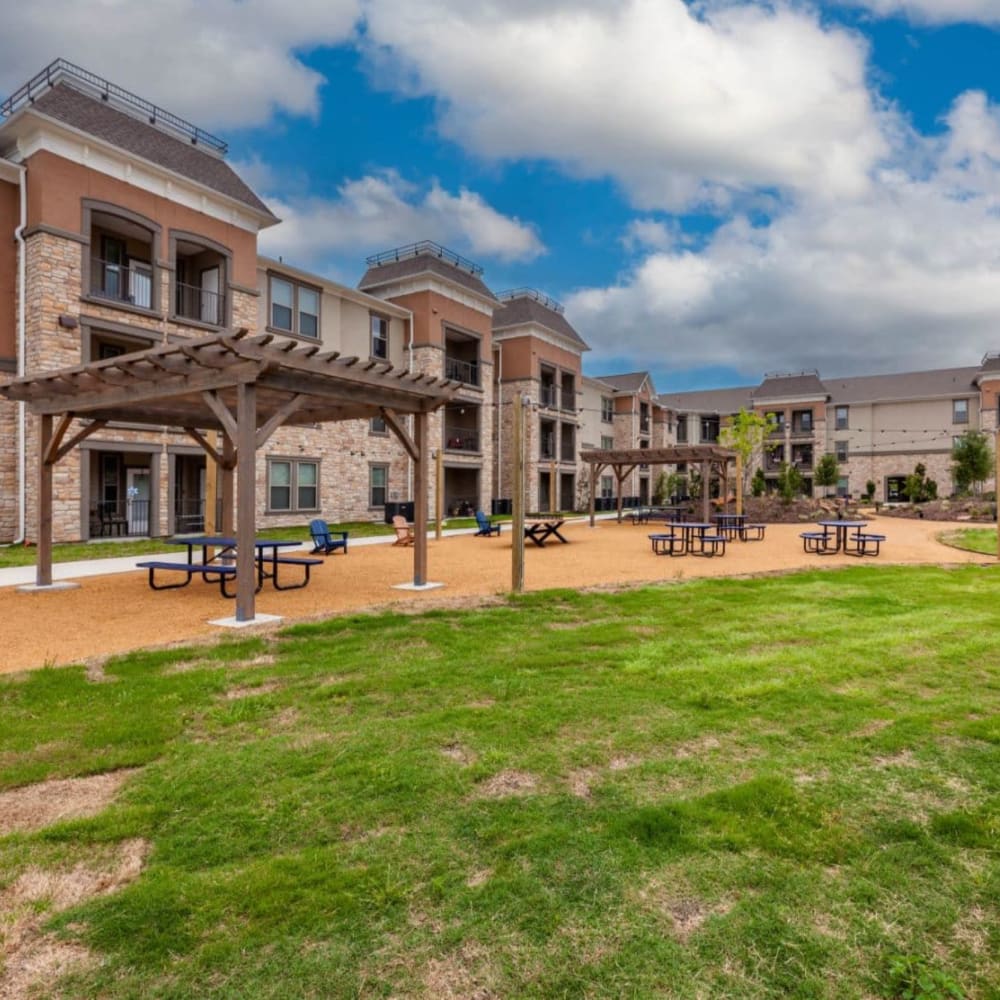 Picnic tables at Luxia Grand Prairie, Grand Prairie, Texas