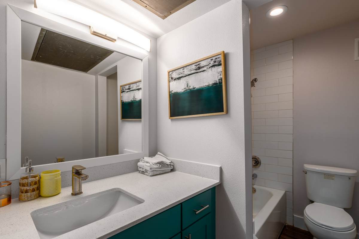 Bathroom with mirror at Sangria Park in Austin, Texas