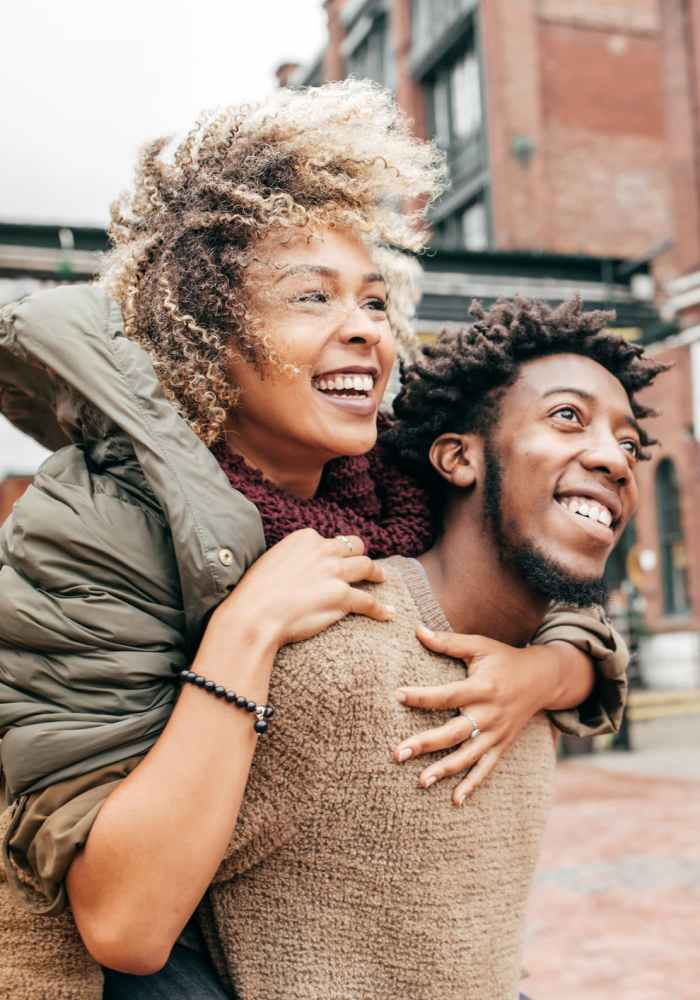 Couple walking around near Venable Durham Apartments in Durham, North Carolina