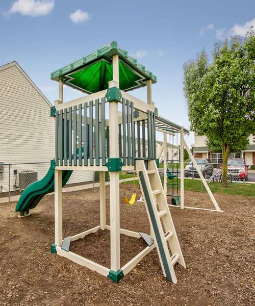 Playground structure with slide and ladder at Wellington Place in Ottawa, Ohio