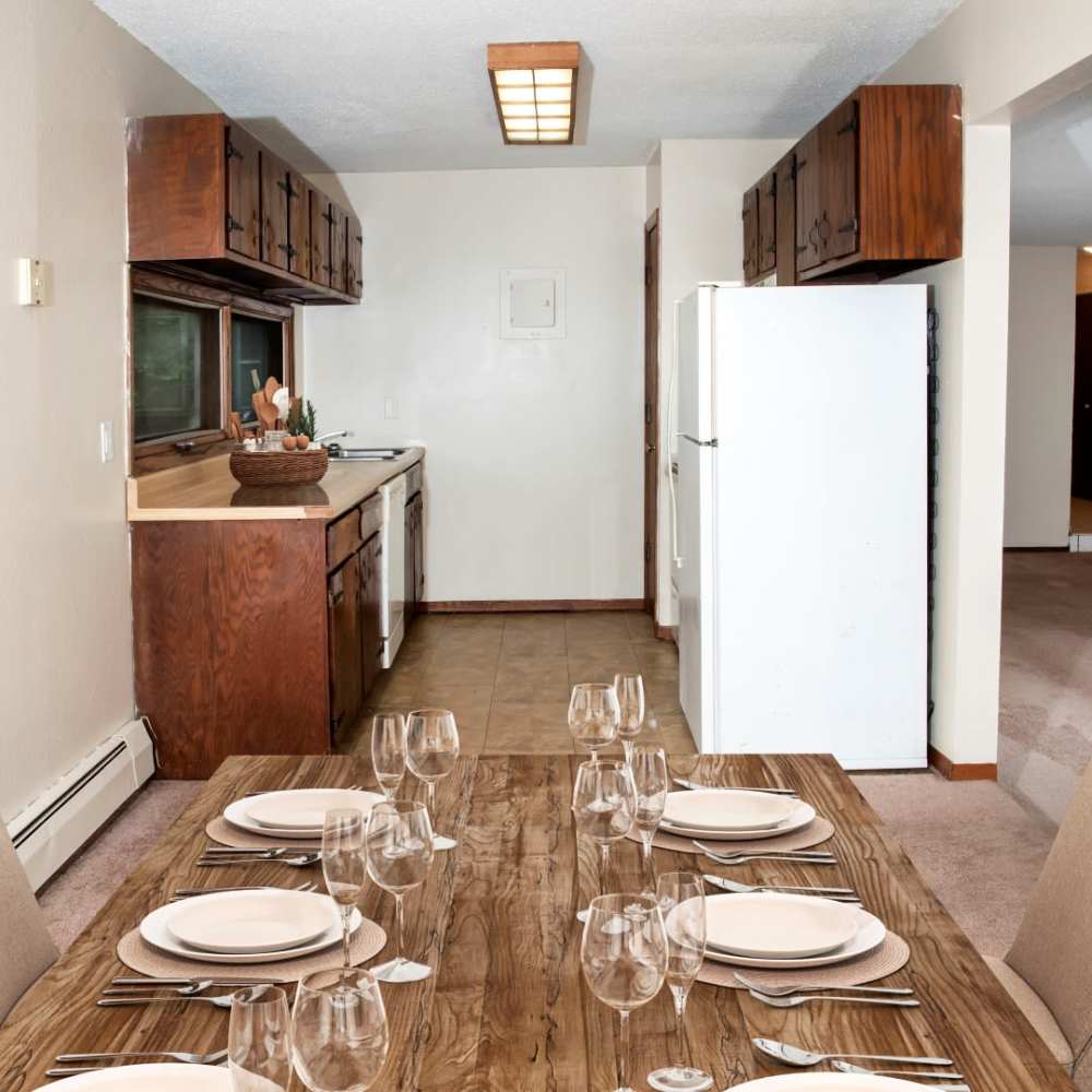 Kitchen with dining area at Bass Lake Crossing in New Hope, Minnesota