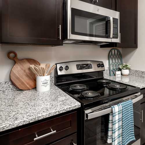 Kitchen with granite countertop at Mills Creek in Gastonia, North Carolina