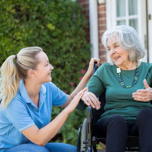 Resident and staff member at Innovation Senior Living in Winter Park, Florida