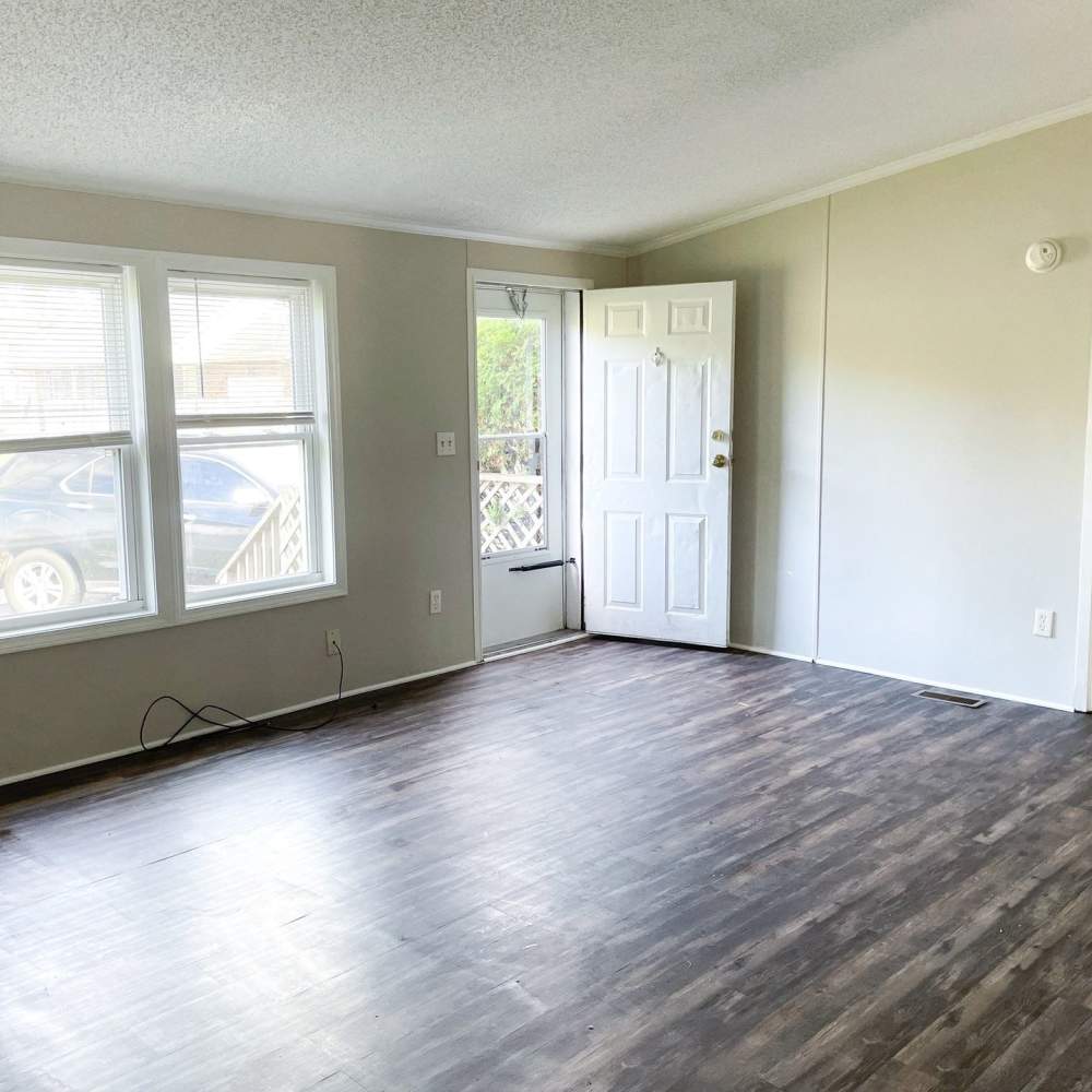 Apartment house with wood style flooring at Fairview Crossing in Scottsburg, Indiana