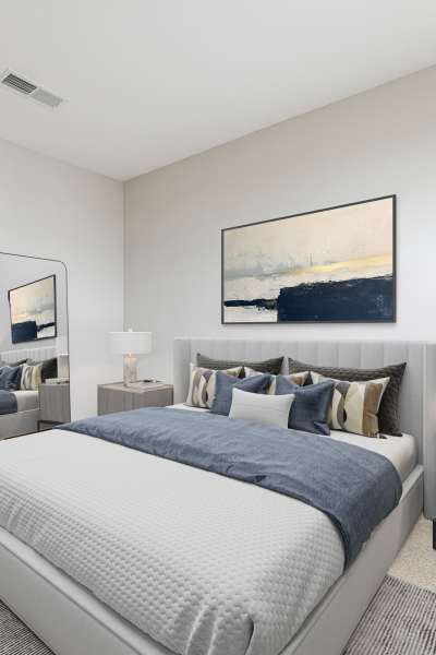 Cozy bedroom at Jade at North Hyde Park in Tampa, Florida