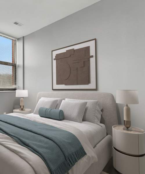 Well lit bedroom at Elmore Apartments in Cincinnati, Ohio