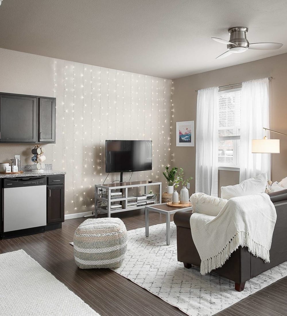 Living room with hardwood-style flooring at The Wyatt in Lexington, Kentucky