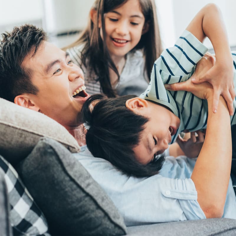 Happy family in their home at Portola Terrace in Temecula, California