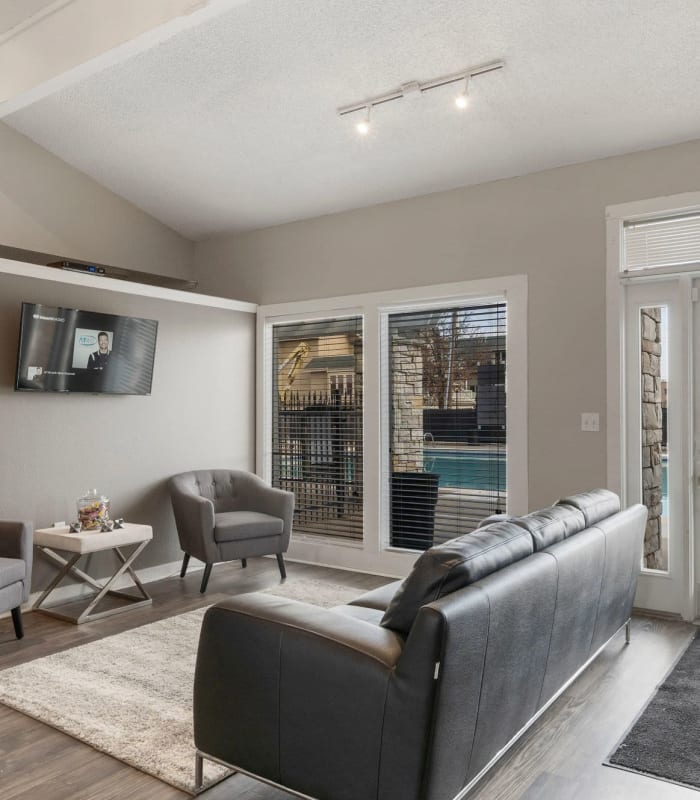 Elegant lounge with TV at Regency Point Apartments in Tulsa, Oklahoma
