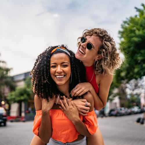 A couple hangs out outside near Hawthorn Village Apartments in Napa, California