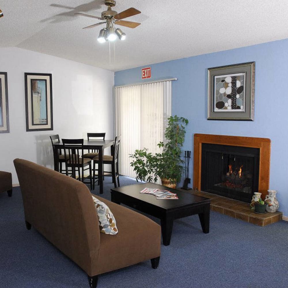 Resident lounge with fireplace at Pepperwood in Davis, California