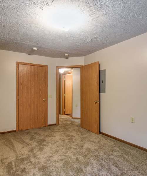 Unfurnished room with carpet flooring at Bayberry Place in Keyser, West Virginia