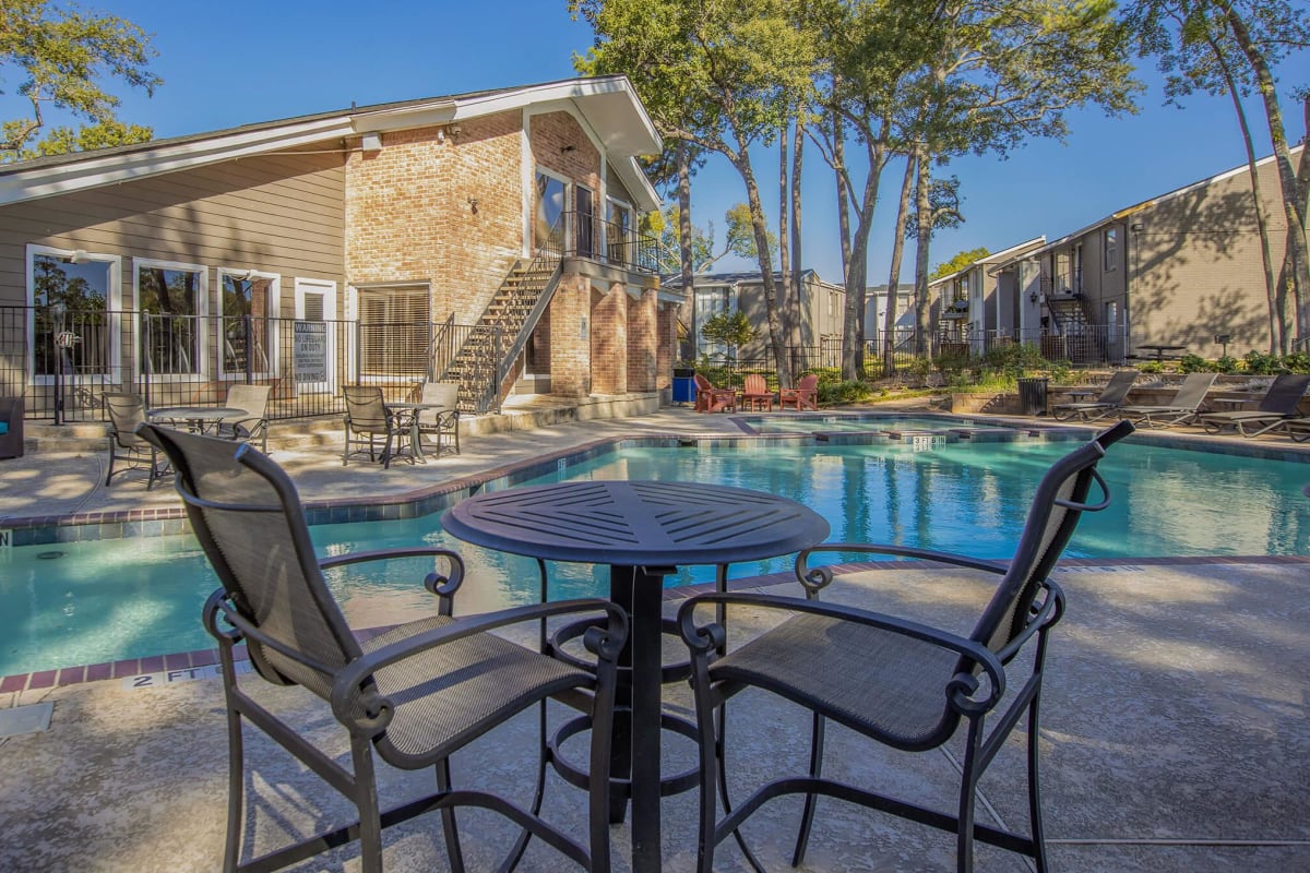 Swimming pool and patio at Bend At Oak Forest in Houston, Texas
