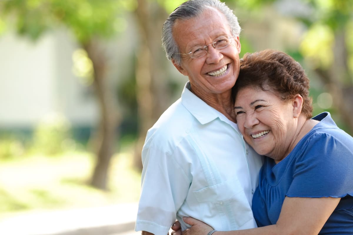 Resident couple walking outside near The Firs in Olympia, Washington