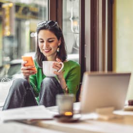 Woman having a coffee near New Medford in Medford, Oregon
