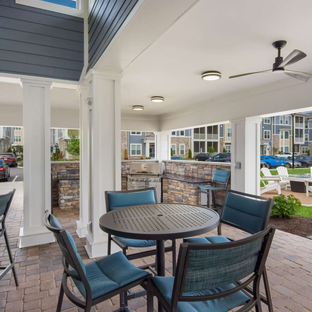 A covered sitting area at The Apartments At Kelton Station in Williamsburg, Virginia