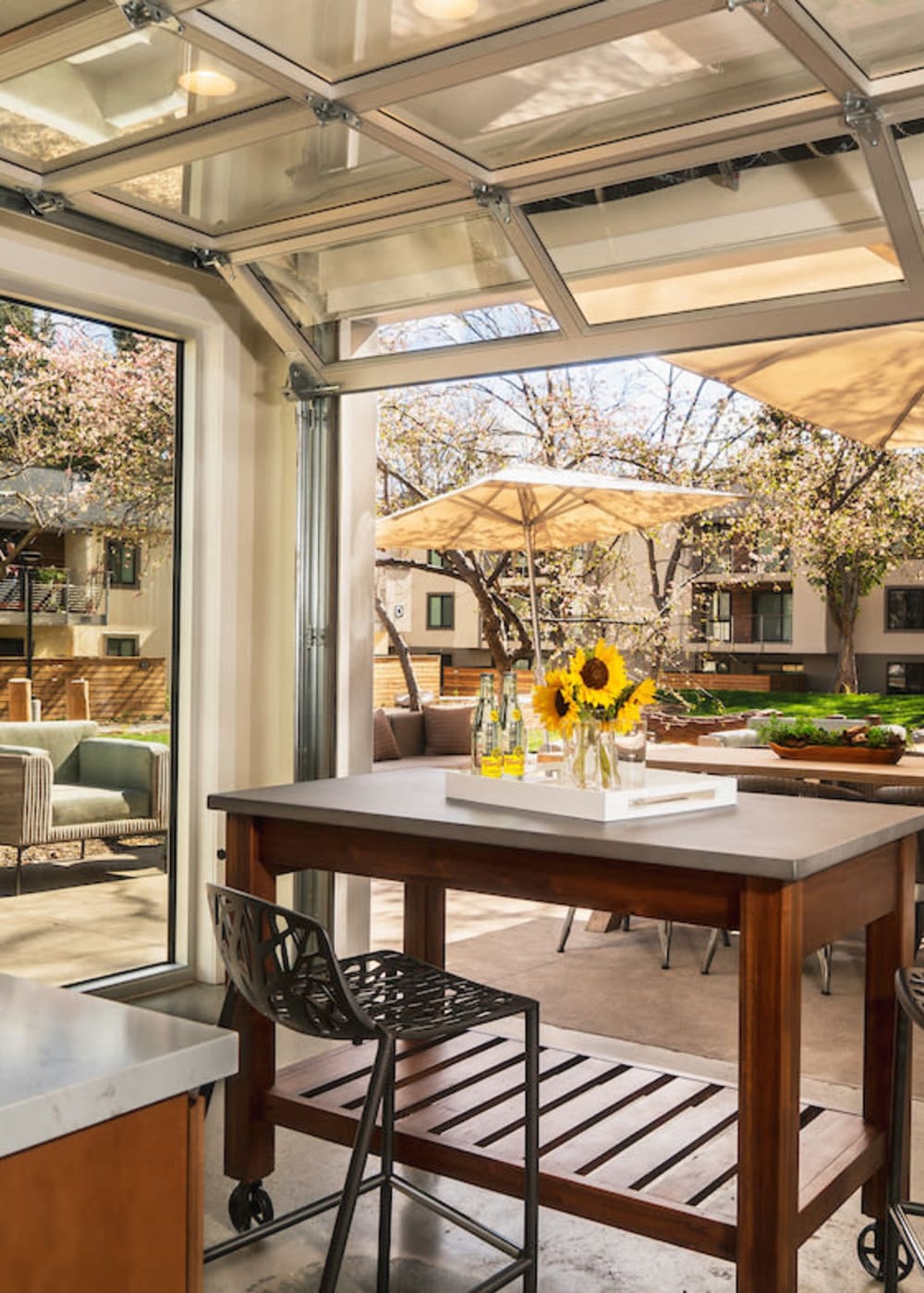 Roll-up doors at the outdoor dining pavilion at Sharon Green in Menlo Park, California