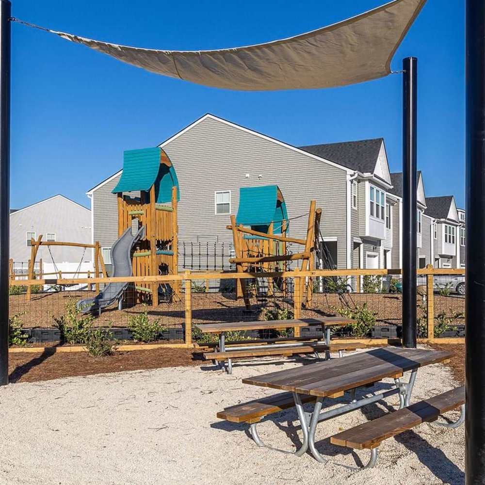 Playground structure with slide and climbing features at Chamberlain Pines in Summerville, South Carolina