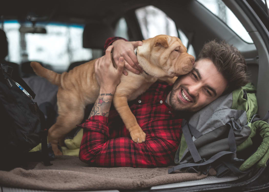 Resident going camping with his lovely dog near Copper Mill Apartments in Richmond, Virginia