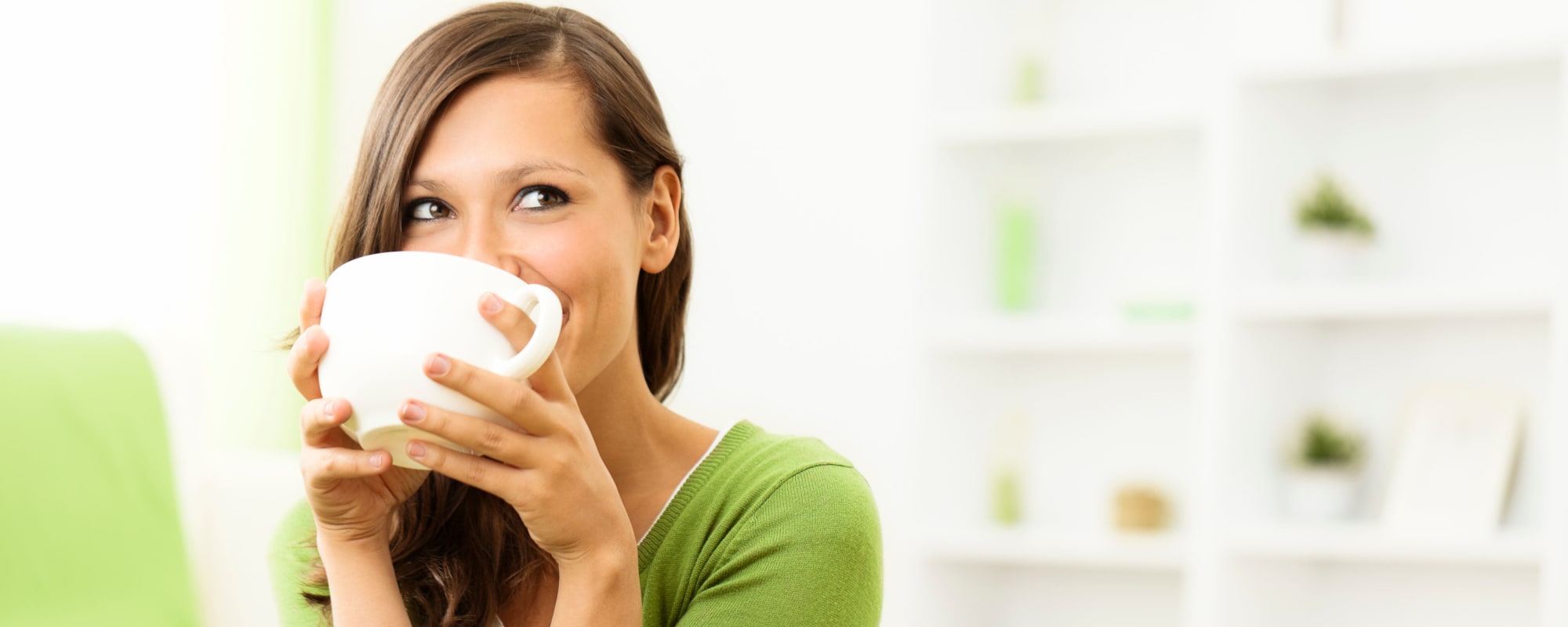 a resident drinking coffee at Norwich Manor in Norfolk, Virginia