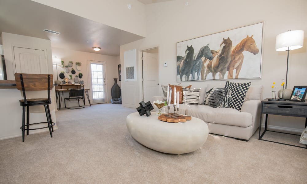 Living room at Portico at Friars Creek Apartments in Temple, Texas