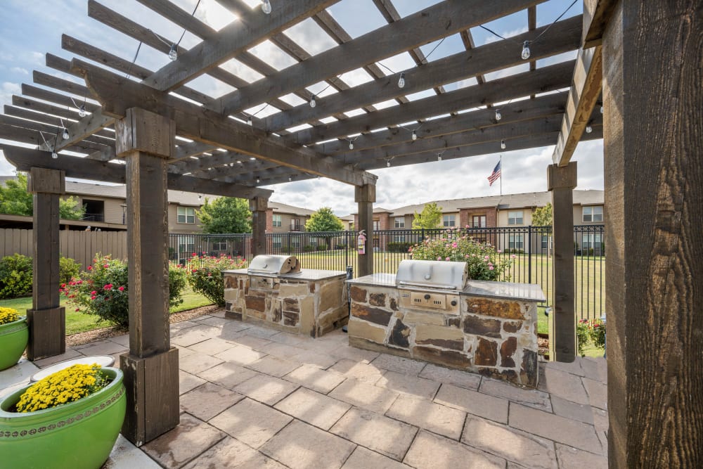 Community barbecue area under a cabana at Anatole at City View in Lubbock, Texas